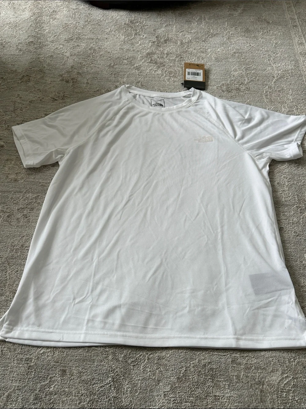 The North Face Men's Large Breeze short sleeve t-shirt.